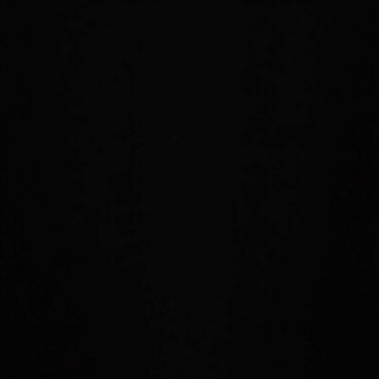 Tintura Imédia Excellence Preto Intenso em fundo escuro.